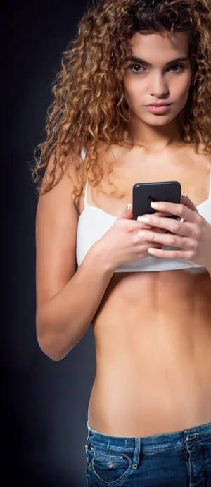 Sexy-Phone-Girl Phone sex slut holding her iphone